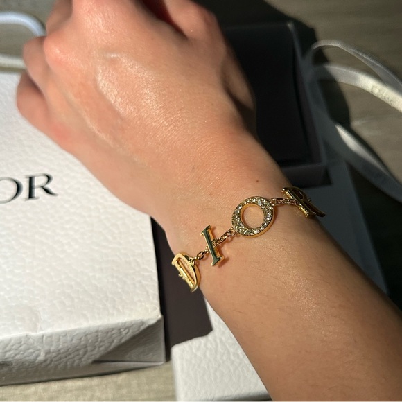 New Dior Revolution Bracelet Gold Metal with white crystals - Picture 6 of 7